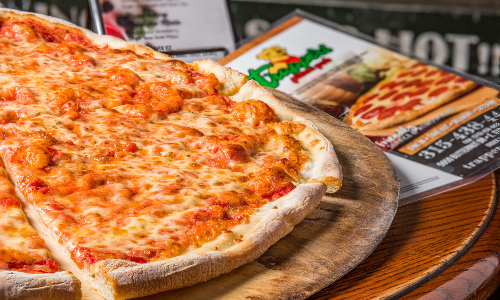 Large cheese pizza from Trapper's Pizza Pub